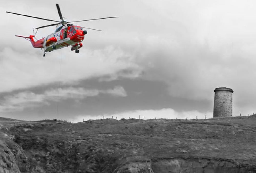 Coast Guard helicopter over Brownstown Head