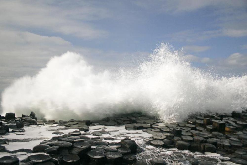 Waves breaking over Giants Causeway, Antrim