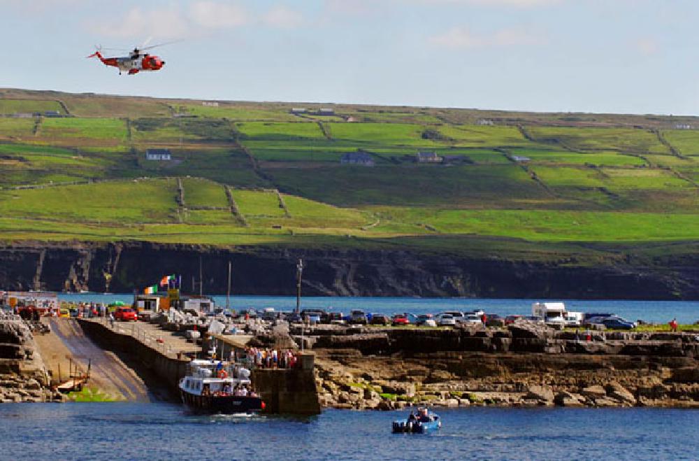 Coast Guard helicopter over Doolin Pier, Co. Clare